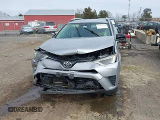 2016 Toyota RAV4 LE with VIN 2T3BFREV8GW432986, listed as a IAAI auction lot 41716530 with 143,442 mi miles. Bid and sale history available at carsss.com. Image 13.