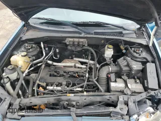 2005 Mazda Tribute i with VIN 4F2YZ02ZX5KM17738, listed as a Copart auction lot 72346384 with 203,245 mi miles and Salvage Title. Bid and sale history available at carsss.com. Image 12.