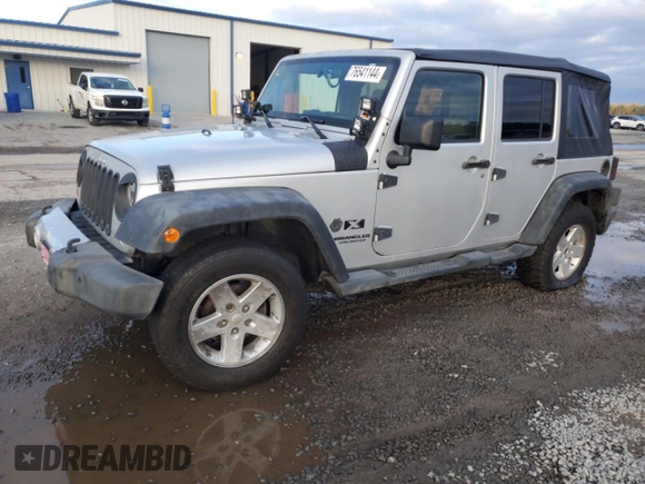 2008 Jeep Wrangler Unlimited X with VIN 1J4GB39138L517920, listed as a Copart auction lot 76541144 with 213,002 mi miles and Salvage Title. Bid and sale history available at DreamBid. Image 1.