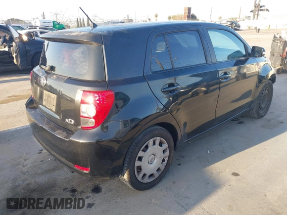2011 Scion xD with VIN JTKKU4B46B1009909, listed as a IAAI auction lot 41959824 with 185,764 mi miles. Bid and sale history available at carsss.com. Image 4.