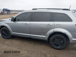 2019 Dodge Journey SE with VIN 3C4PDCBG9KT869149, listed as a IAAI auction lot 41472289 with 97,333 mi miles and . Bid and sale history available at DreamBid. Image 15.