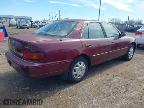 1996 Toyota Camry DX with VIN 4T1BG12K1TU785209, listed as a IAAI auction lot 41802026 with 223,452 mi miles. Bid and sale history available at carsss.com. Image 4.