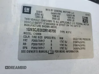 2013 Chevrolet Suburban LT with VIN 1GNSCJE0XDR146798, listed as a Copart auction lot 62408525 with 218,484 mi miles and Salvage title. Bid and sale history available at DreamBid. Image 13.