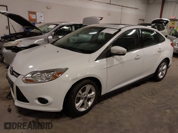 2014 Ford Focus SE with VIN 1FADP3F21EL200534, listed as a IAAI auction lot 41942026 with 61,414 mi miles. Bid and sale history available at carsss.com. Image 2.