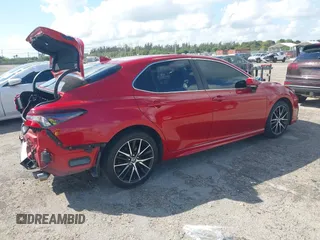 2022 Toyota Camry SE with VIN 4T1S11AK1NU052325, listed as a IAAI auction lot 41618906 with 64,632 mi miles and . Bid and sale history available at DreamBid. Image 4.