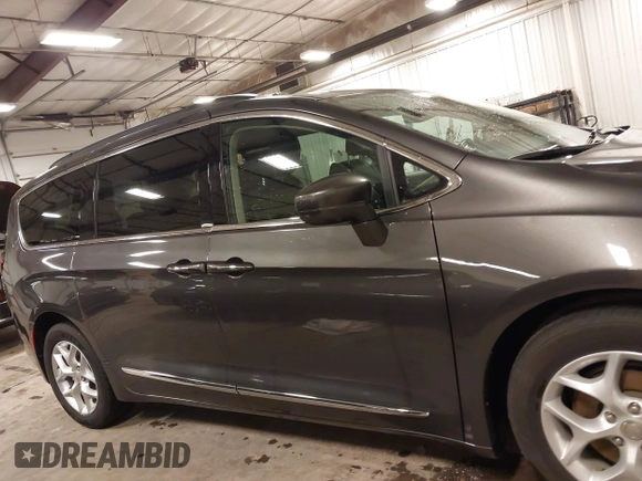 2017 Chrysler Pacifica Touring L with VIN 2C4RC1BG5HR803306, listed as a IAAI auction lot 41968455 with 84,714 mi miles and . Bid and sale history available at DreamBid. Image 14.