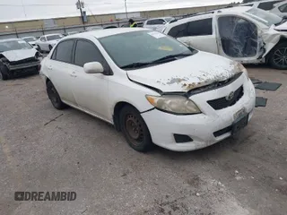 2009 Toyota Corolla with VIN 1NXBU40E89Z027710, listed as a IAAI auction lot 41573469 with 182,514 mi miles. Bid and sale history available at carsss.com. Image 1.