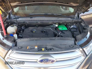 2015 Ford Edge Titanium z VIN 2FMTK3K90FBC12582, wystawiony jako IAAI lot #41860973 z przebiegiem Nie podano mil oraz . Historia ofert i sprzedaży dostępna na DreamBid. Obrazek 10.