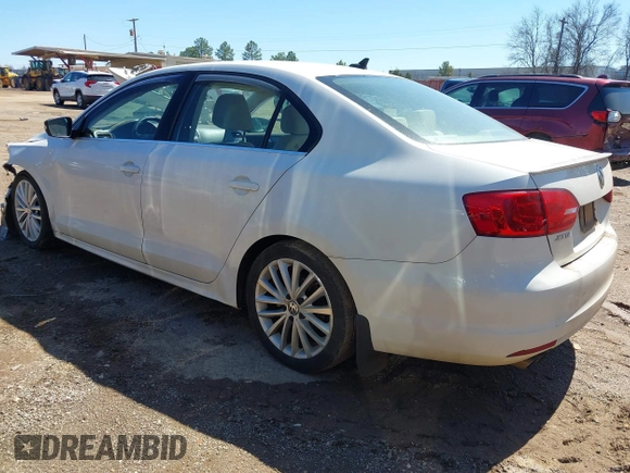 2013 Volkswagen Jetta TDI w/Premium with VIN 3VW3L7AJ4DM361445, listed as a IAAI auction lot 41735571 with 133,894 mi miles and . Bid and sale history available at DreamBid. Image 3.