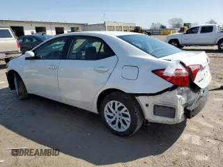 2019 Toyota Corolla L with VIN 5YFBURHE8KP883663, listed as a Copart auction lot 52443625 with 150,025 mi miles and Salvage Title. Bid and sale history available at DreamBid. Image 2.
