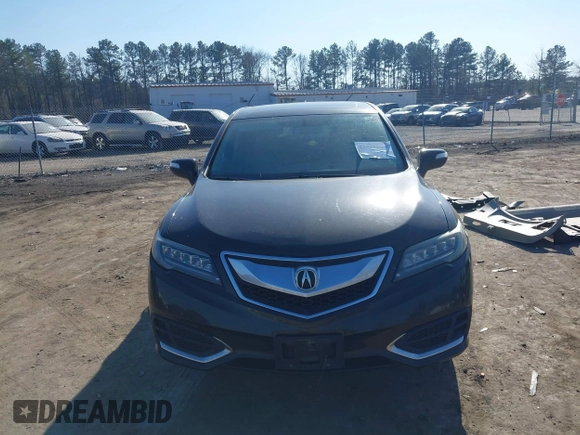 2016 Acura RDX with VIN 5J8TB4H36GL011656, listed as a IAAI auction lot 41421569 with 128,005 mi miles. Bid and sale history available at carsss.com. Image 13.