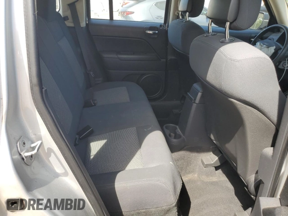 2010 Jeep Patriot Sport z VIN 1J4NF2GB1AD649544, wystawiony jako Copart lot #55086225 z przebiegiem 98 944 mil mil oraz Szkoda całkowita • Salvage title. Historia ofert i sprzedaży dostępna na DreamBid. Obrazek 11.