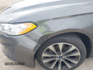 2020 Ford Fusion SE with VIN 3FA6P0T99LR173347, listed as a IAAI auction lot 42090457 with 118,359 mi miles and . Bid and sale history available at DreamBid. Image 6.