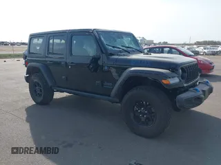 2024 Jeep Wrangler Willys z VIN 1C4RJXN65RW189541, wystawiony jako IAAI lot #40646503 z przebiegiem 8 387 mil mil oraz . Historia ofert i sprzedaży dostępna na DreamBid. Obrazek 1.