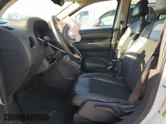 2014 Jeep Compass Latitude with VIN 1C4NJDEB9ED911237, listed as a Copart auction lot 85651674 with Not Provided miles and Salvage Title. Bid and sale history available at DreamBid. Image 7.
