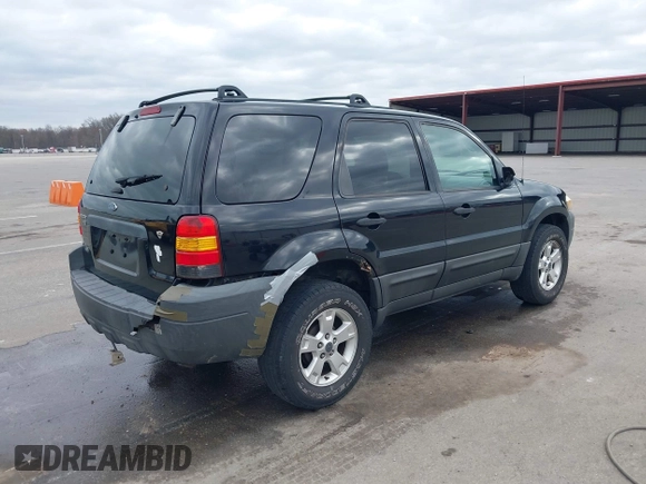 2005 Ford Escape XLT with VIN 1FMCU03135KB37656, listed as a IAAI auction lot 41908207 with 191,899 mi miles. Bid and sale history available at carsss.com. Image 4.