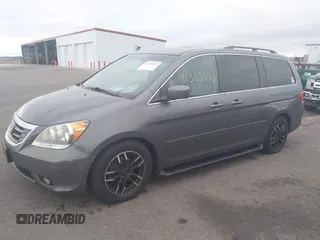 2008 Honda Odyssey Touring with VIN 5FNRL38888B018625, listed as a IAAI auction lot 41383235 with 215,255 mi miles. Bid and sale history available at carsss.com. Image 2.