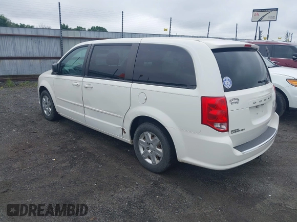 2012 Dodge Grand Caravan SE with VIN 2C4RDGBG8CR115003, listed as a IAAI auction lot 42217153 with 196,833 mi miles and . Bid and sale history available at DreamBid. Image 3.