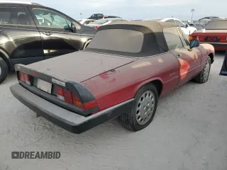 1990 Alfa Romeo Spider z VIN ZARBA12G6L6001683, wystawiony jako Copart lot #75611344 z przebiegiem 59 515 mil mil oraz Szkoda całkowita • Salvage title. Historia ofert i sprzedaży dostępna na DreamBid. Obrazek 3.