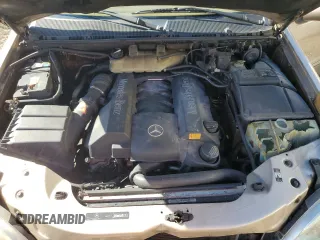 2005 Mercedes-Benz M 500 with VIN 4JGAB75E85A529110, listed as a Copart auction lot 80557034 with 130,560 mi miles and Salvage title. Bid and sale history available at DreamBid. Image 11.