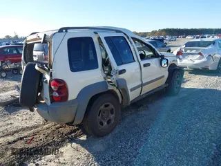 2005 Jeep Liberty Sport with VIN 1J4GK48KX5W679070, listed as a IAAI auction lot 41807899 with 157,726 mi miles. Bid and sale history available at carsss.com. Image 4.