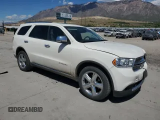 2012 Dodge Durango Citadel with VIN 1C4SDJET7CC309313, listed as a Copart auction lot 56491065 with 154,116 mi miles and Salvage title. Bid and sale history available at DreamBid. Image 4.