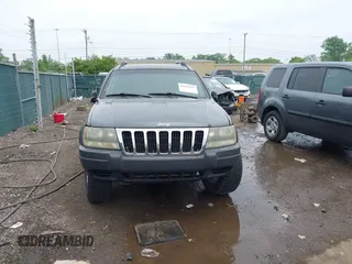 2003 Jeep Grand Cherokee Laredo z VIN 1J4GW48S73C545863, wystawiony jako IAAI lot #42222247 z przebiegiem 128 529 mil mil oraz . Historia ofert i sprzedaży dostępna na DreamBid. Obrazek 12.