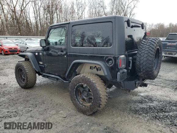 2014 Jeep Wrangler Sahara with VIN 1C4AJWBG0EL306703, listed as a Copart auction lot 51450215 with 115,932 mi miles and Salvage Title. Bid and sale history available at DreamBid. Image 2.