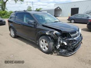 2013 Dodge Journey SE with VIN 3C4PDCAB0DT500365, listed as a Copart auction lot 61033665 with 193,231 mi miles and Salvage title. Bid and sale history available at DreamBid. Image 4.