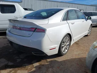 2014 Lincoln MKZ with VIN 3LN6L2GKXER817659, listed as a IAAI auction lot 40896691 with 84,164 mi miles and . Bid and sale history available at DreamBid. Image 4.