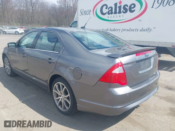 2010 Ford Fusion SE with VIN 3FAHP0HA3AR248729, listed as a IAAI auction lot 42030832 with 113,972 mi miles. Bid and sale history available at carsss.com. Image 3.