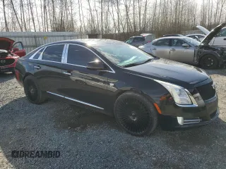 2013 Cadillac XTS Platinum z VIN 2G61V5S32D9227585, wystawiony jako Copart lot #49172025 z przebiegiem 124 646 mil mil oraz Czysty tytuł • Clean title. Historia ofert i sprzedaży dostępna na DreamBid. Obrazek 4.