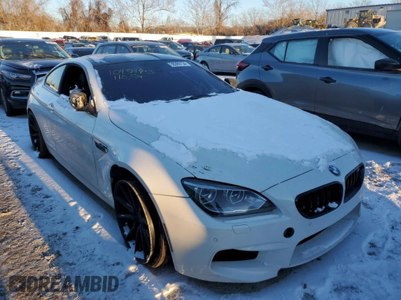 2014 BMW M6 z VIN WBSLX9C51ED160286, wystawiony jako Copart lot #38369134 z przebiegiem Nie podano mil oraz Szkody całkowita. Historia ofert i sprzedaży dostępna na DreamBid. Obrazek 4.