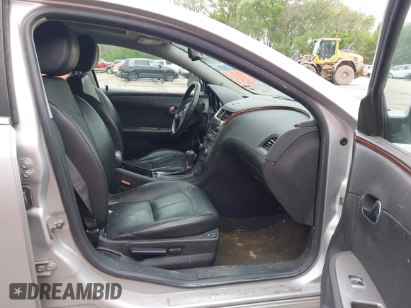2012 Chevrolet Malibu LTZ with VIN 1G1ZG5E78CF159025, listed as a IAAI auction lot 42117210 with 199,001 mi miles and . Bid and sale history available at DreamBid. Image 5.