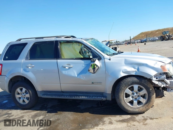 2009 Ford Escape Hybrid with VIN 1FMCU49369KA60514, listed as a IAAI auction lot 42203433 with 196,000 mi miles and . Bid and sale history available at DreamBid. Image 13.