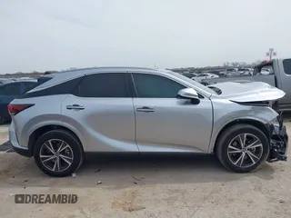 2023 Lexus RX with VIN 2T2BAMBA0PC021669, listed as a IAAI auction lot 41738114 with 14,575 mi miles. Bid and sale history available at carsss.com. Image 14.