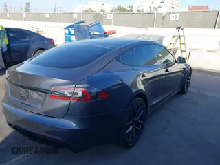 2021 Tesla Model S Long Range with VIN 5YJSA1E53MF436865, listed as a IAAI auction lot 41384837 with 20,829 mi miles and . Bid and sale history available at DreamBid. Image 4.