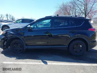 2018 Toyota RAV4 LE with VIN 2T3BFREV1JW827888, listed as a IAAI auction lot 41901303 with 181,279 mi miles. Bid and sale history available at carsss.com. Image 14.
