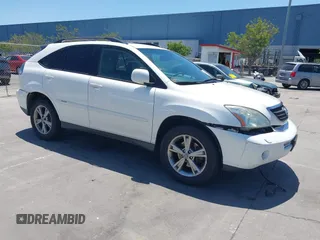 2007 Lexus RX 400h z VIN JTJGW31U572001690, wystawiony jako IAAI lot #42327657 z przebiegiem 245 809 mil mil oraz . Historia ofert i sprzedaży dostępna na DreamBid. Obrazek 1.