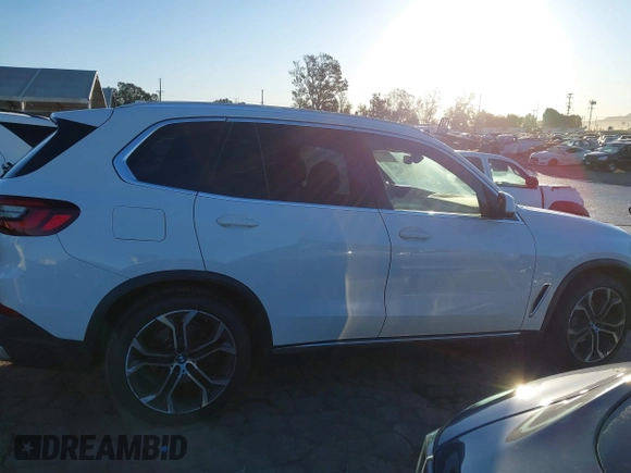2021 BMW X5 sDrive40i with VIN 5UXCR4C03M9G59554, listed as a IAAI auction lot 41358056 with 47,577 mi miles. Bid and sale history available at carsss.com. Image 14.