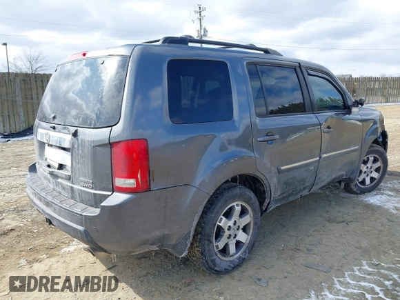 2011 Honda Pilot Touring with VIN 5FNYF4H98BB016012, listed as a IAAI auction lot 41634844 with 202,160 mi miles. Bid and sale history available at carsss.com. Image 4.