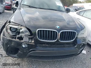 2011 BMW X5 35i with VIN 5UXZV4C58BL406373, listed as a IAAI auction lot 41715817 with 101,900 mi miles. Bid and sale history available at carsss.com. Image 6.