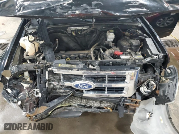 2012 Ford Escape XLT z VIN 1FMCU9D74CKB91598, wystawiony jako Copart lot #51667805 z przebiegiem 182 152 mil mil oraz Szkoda całkowita • Salvage title. Historia ofert i sprzedaży dostępna na DreamBid. Obrazek 13.