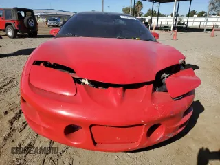 2001 Pontiac Firebird Formula z VIN 2G2FV22G112117625, wystawiony jako Copart lot #81836394 z przebiegiem 142 503 mil mil oraz Szkoda całkowita • Salvage title. Historia ofert i sprzedaży dostępna na DreamBid. Obrazek 5.