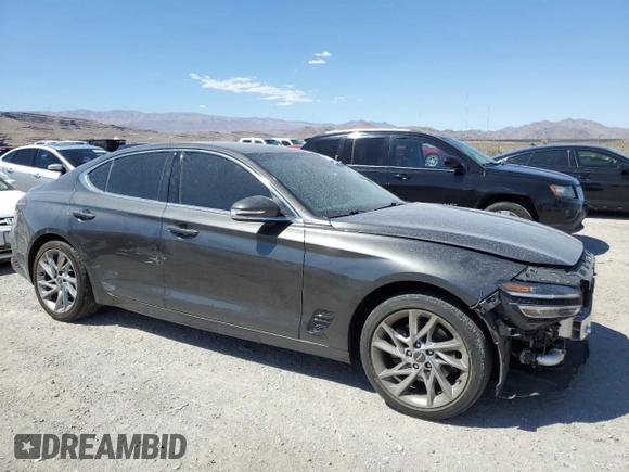 2022 Genesis G70 2.0T with VIN KMTG34TA3NU099562, listed as a Copart auction lot 69646954 with 50,334 mi miles and Salvage Title. Bid and sale history available at carsss.com. Image 4.