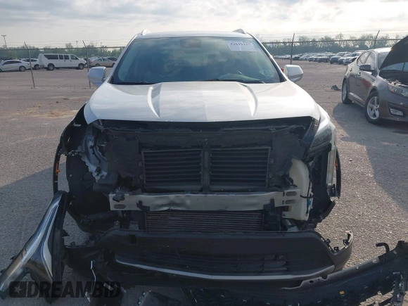 2019 Cadillac XT4 FWD Premium Luxury with VIN 1GYFZCR42KF228986, listed as a IAAI auction lot 42019157 with 79,397 mi miles and . Bid and sale history available at DreamBid. Image 12.