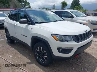 2021 Jeep Compass Trailhawk with VIN 3C4NJDDB1MT571866, listed as a IAAI auction lot 42470366 with 82,596 mi miles and . Bid and sale history available at DreamBid. Image 1.