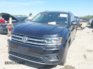 2019 Volkswagen Atlas SE z VIN 1V2WR2CA4KC595211, wystawiony jako IAAI lot #41986643 z przebiegiem 96 299 mil mil oraz . Historia ofert i sprzedaży dostępna na DreamBid. Obrazek 2.