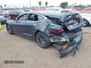 2020 Tesla Model S Long Range with VIN 5YJSA1E29LF363957, listed as a IAAI auction lot 42402667 with 45,058 mi miles and . Bid and sale history available at DreamBid. Image 3.