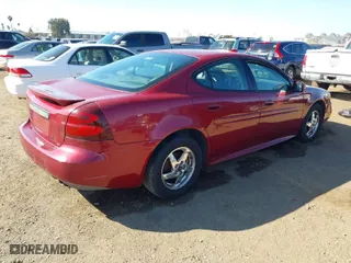 2004 Pontiac Grand Prix GT2 with VIN 2G2WS522141217359, listed as a IAAI auction lot 41677677 with 121,581 mi miles. Bid and sale history available at carsss.com. Image 4.
